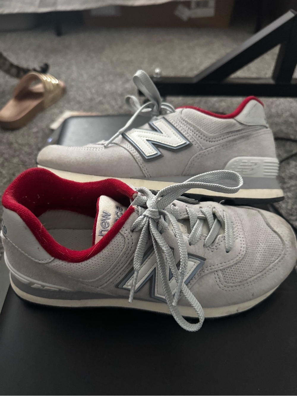 New Balance women’s Light Gray Suede Sneakers with Red Lining